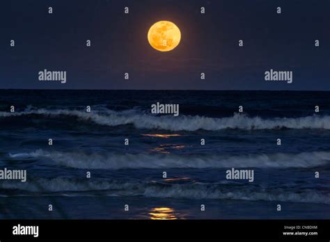 Full Moon rising over Atlantic ocean from beach on Hilton Head Island South Carolina by Jim ...