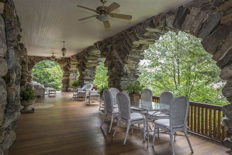 Huge Veranda With Stone Arches Roomfans