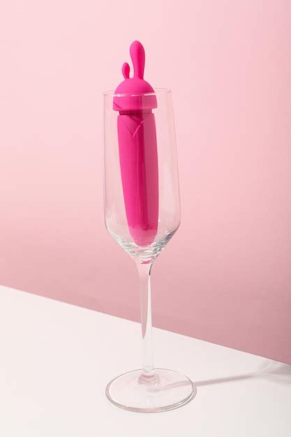 Premium Photo Sex Toy With Christmas Decor On A Pink Background