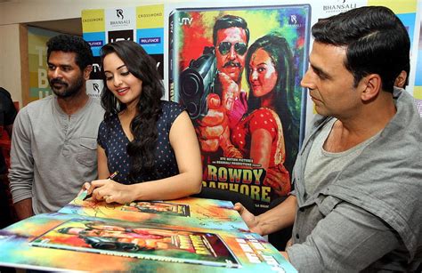 Akshay Kumar And Sonakshi Sinha Signing Autographs At DVD Launch Of