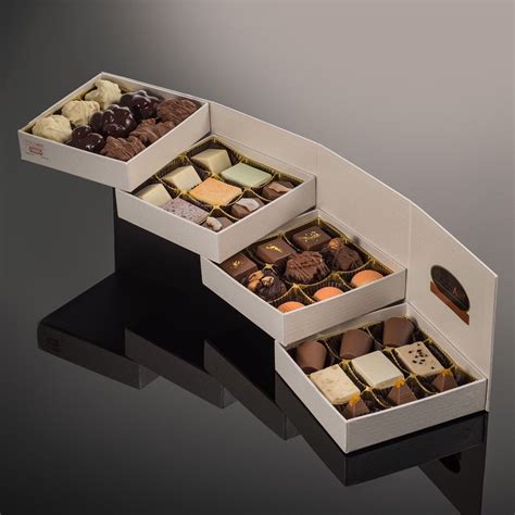 A Beautiful Four Tier Box With 36 Peace Of Cocoart Chocolate