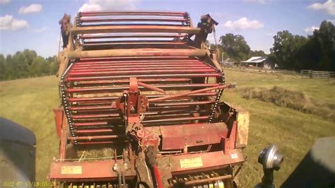 Baling Round Bale Hay With My New Holland 850 Chain Baler Youtube