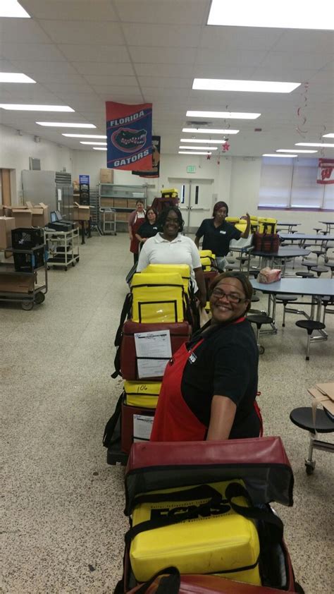 Cafeteria Team Rolling Out To Deliver Breakfast In The Classroom