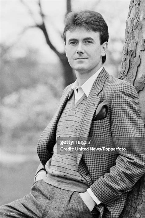 Irish actor Bryan Murray posed leaning against a tree in London on ...