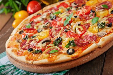 Pizza With Salami Tomato Cheese And Olives Stock Photo By Timolina