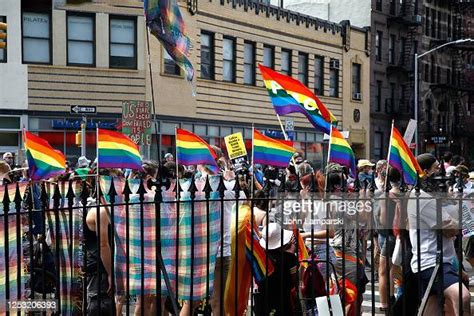 Marchers Congregate In Front Of The Stonewall Inn During The Queer