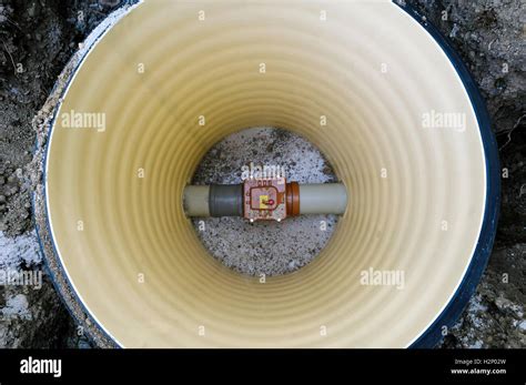 Sewage Shaft From Above With Sewer Pipe Inside Stock Photo Alamy