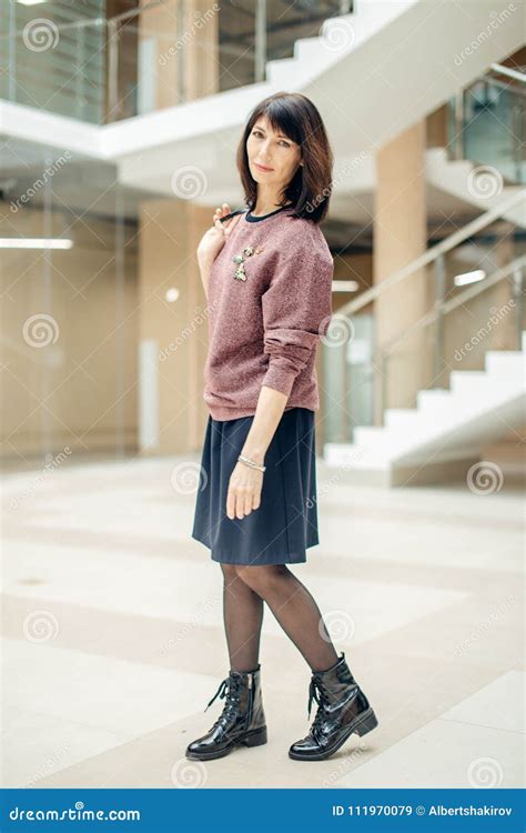 Mature Woman Walking Confidently In Mall While Looking At Camera Stock Image Image Of Call