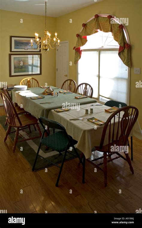 Dining Dinner Table near Window Stock Photo - Alamy