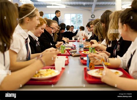 Secondary School Children In The Canteen Having Lunch Wales Uk Stock