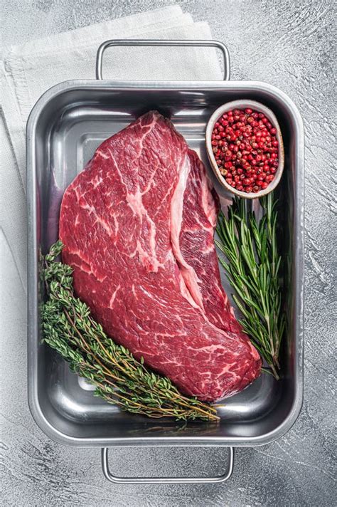 Butcher Tray With Raw Top Sirloin Beef Meat Steak White Background