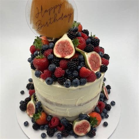 Semi Naked Cake With An Abundance Of Fresh Fruit Birthday Cake