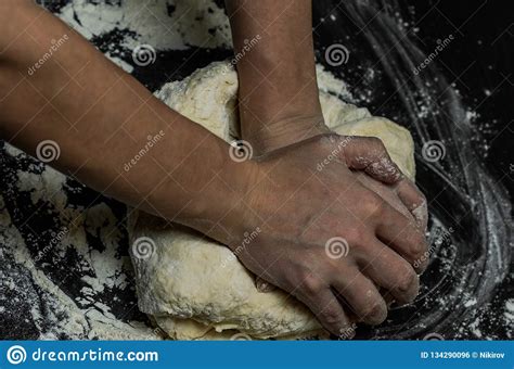 The Cook Kneads The Dough With Flour Stock Photo Image Of Kneading