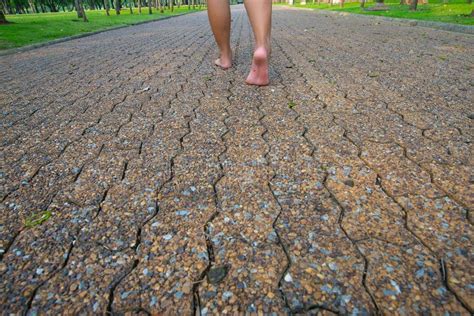 Man Walking on the Road Barefoot in the Park Stock Photo - Image of ...