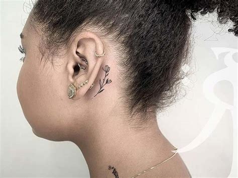 Simple Lotus Flower Tattoo Behind Ear