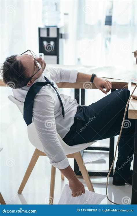 Tired Young Businessman Sleeping On Chair Stock Image Image Of