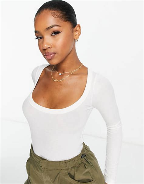 Stradivarius Long Sleeve Scoop Neck Ribbed Top In White Asos