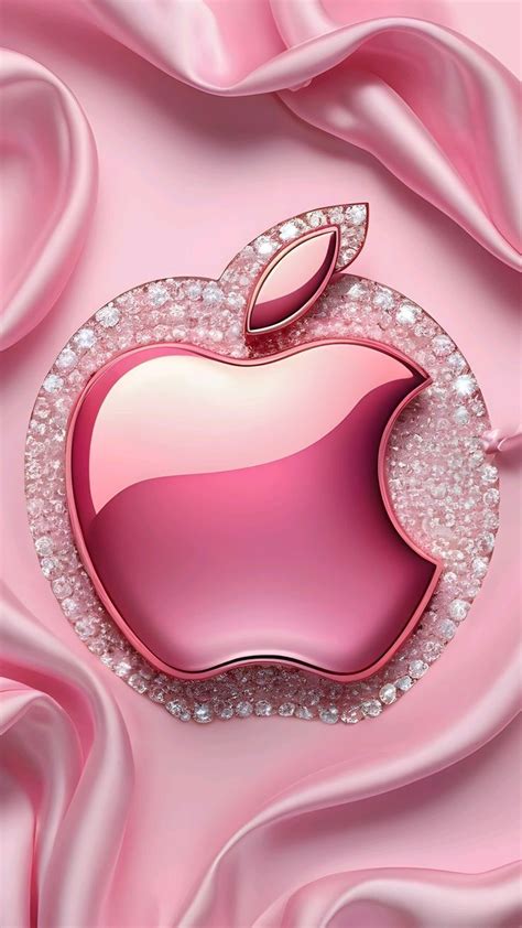 An Apple Logo On Pink Satin With Diamonds In The Shape Of An Apple And