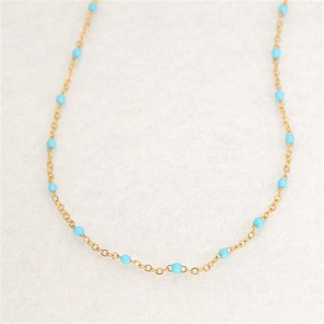 Collier Etika En Acier Jaune Et Perle De R Sine Turquoise Ae C Pr