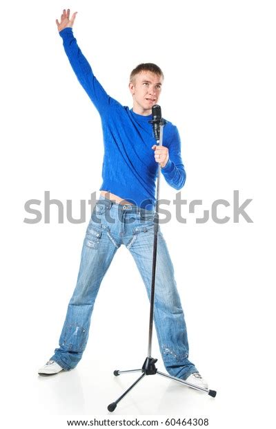 Young Man Singing Into Microphone On Stock Photo 60464308 Shutterstock