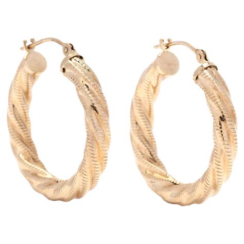 14 Karat Yellow Gold Large Twist Hoop Earrings At 1stdibs