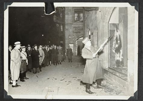 Secret Kristallnacht photos show Nazi officers' role attacking Jewish ...