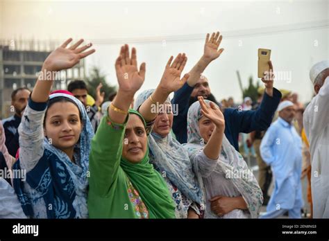 Relatives Waves Their Hands As Kashmiri Muslim Pilgrimages Leaves For