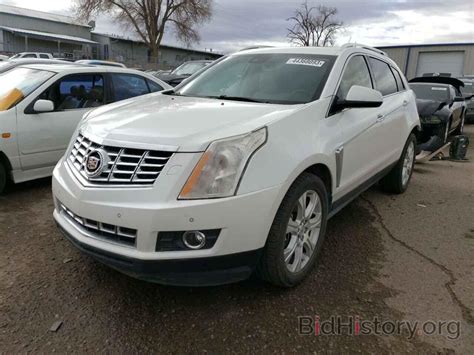 Report 3gyfnce38es576493 Cadillac Srx 2014 White Gas Price And Damage