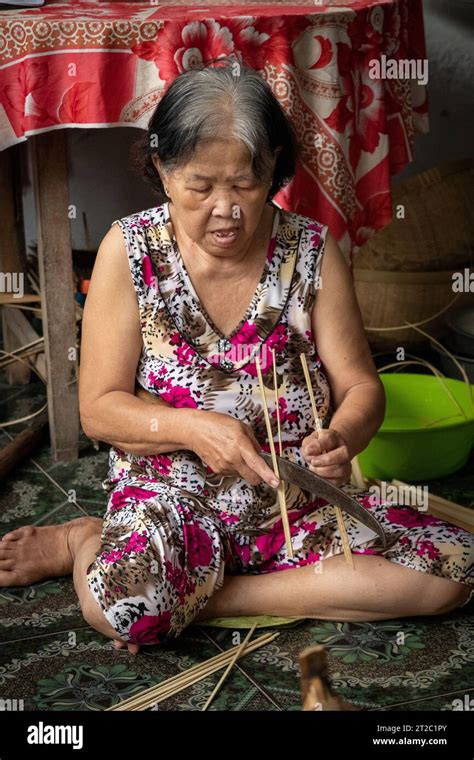 Splitting Bamboo For Weaving Baskets Mekong Delta Vietnam Stock Photo