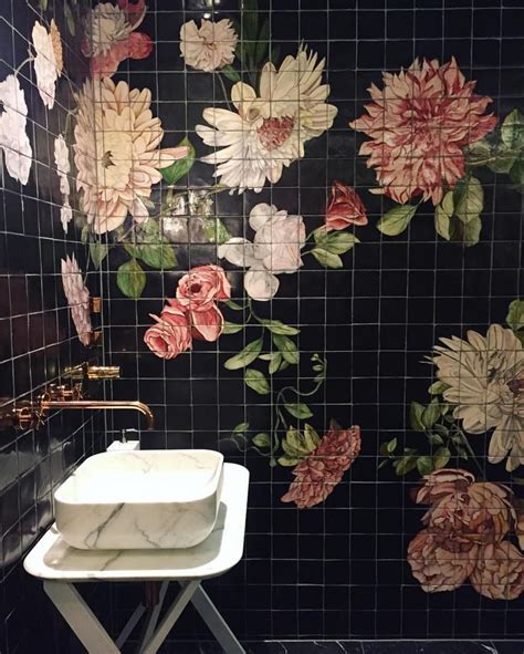 Dramatic Floral Bathroom with Black Tiles and Flower Wall Decor