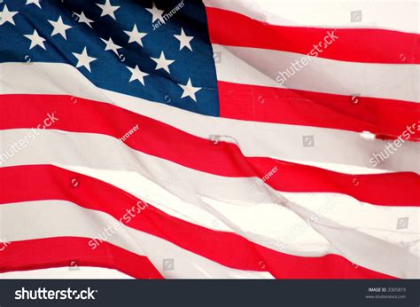 American Flag Torn Flapping In The Wind Stock Photo 3305819 Shutterstock