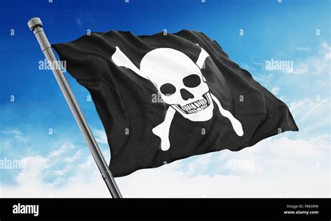 Pirate flag waving on blue background Stock Photo - Alamy