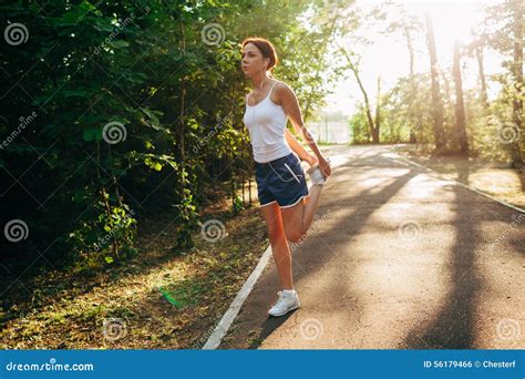 Yong Sporty Woman Streching Her Leg Stock Photo Image Of Person