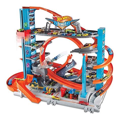 Hot Wheels City Garage Delle Acrobazie Playset Con Pista Collegabile Con Ascensore E Squalo