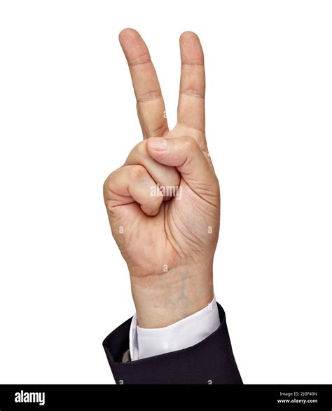 Close Up Of A Hand Making V Sign Victory White Background Stock Photo