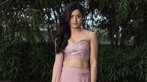 Beautiful Rashmika Mandanna Is Wearing Peach Color Dress Standing In