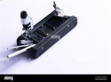 Black bicycle multifunctional multitool unfolded on a white background ...