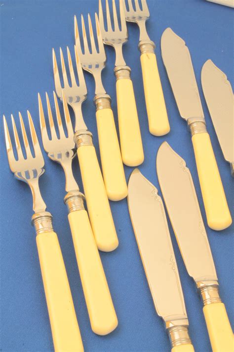 Decorated Chromium Plated Set Of Bone Handled Fish Knives And Forks