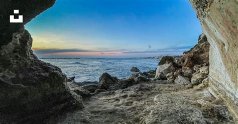 A view of the ocean from inside a cave photo – Free Anzio Image on Unsplash