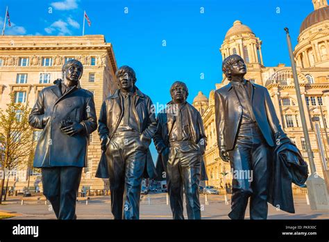 London UK May 17 2018 Bronze Statue Of The Beatles Stands At The