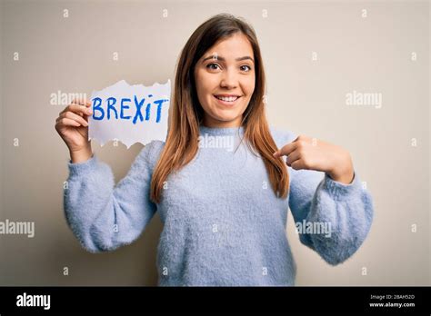 Young Blonde Woman Holding Brexit Banner From Political Referendum Over