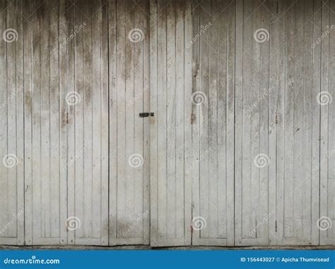 Antique White Wooden Doors With Old And External Architecture Stock