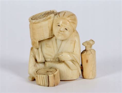 Netsuke chłop z koszami Japonia XIX w 11558029149 oficjalne