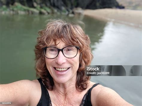 Woman Takes A Selfie While Skinny Dipping In The Sea At Three Cliffs