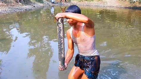 Catfish Catching From Fish Hole By Hand Amazing Muddy Water Fishing