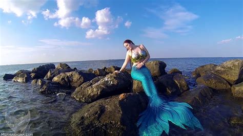 Real Mermaid On Rock