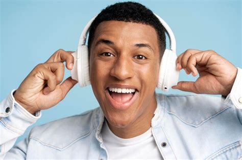 Premium Photo Happy Man Wearing Headphones Enjoying Favourite Music