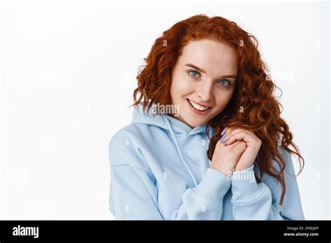 Close Up Portrait Of Flirty And Lovely Redhead Girl Making Coquettish