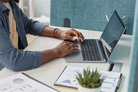 Close Up Of Unrecognizable Black Man Typing At Laptop Keyboard Stock