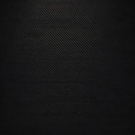 Premium Photo | Black carbon fiber texture pattern background